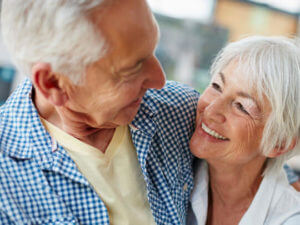 smiling old couple - implants - why choose us - keysborough dentist - dental at keys