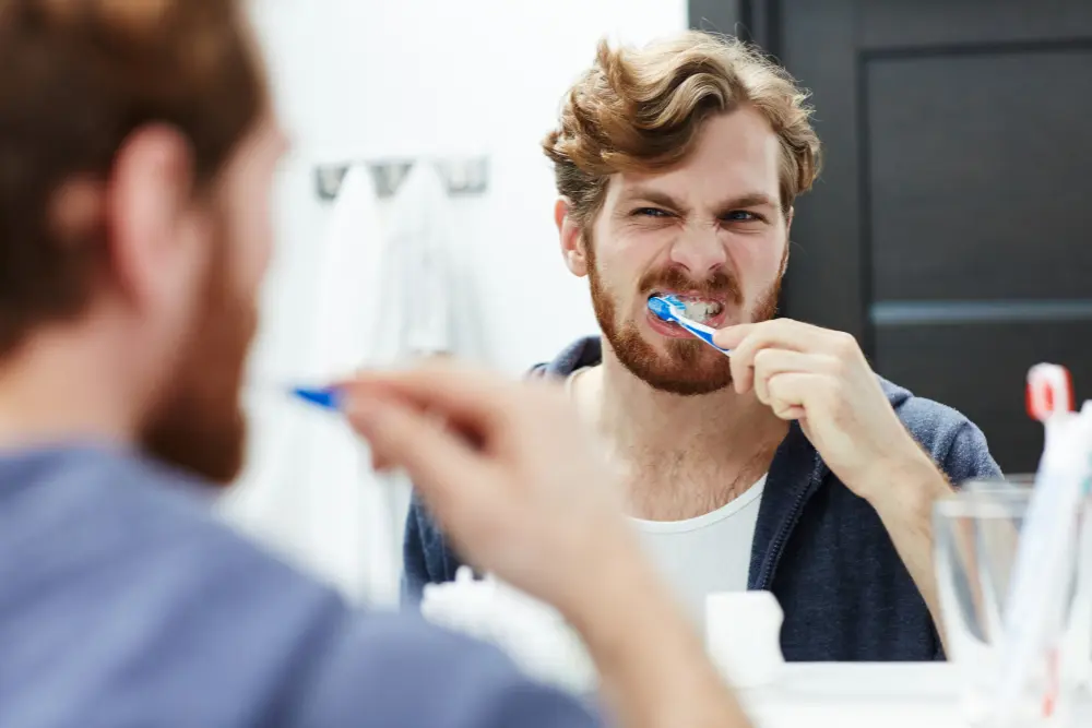 Hygiene Tips-man brushing teeth