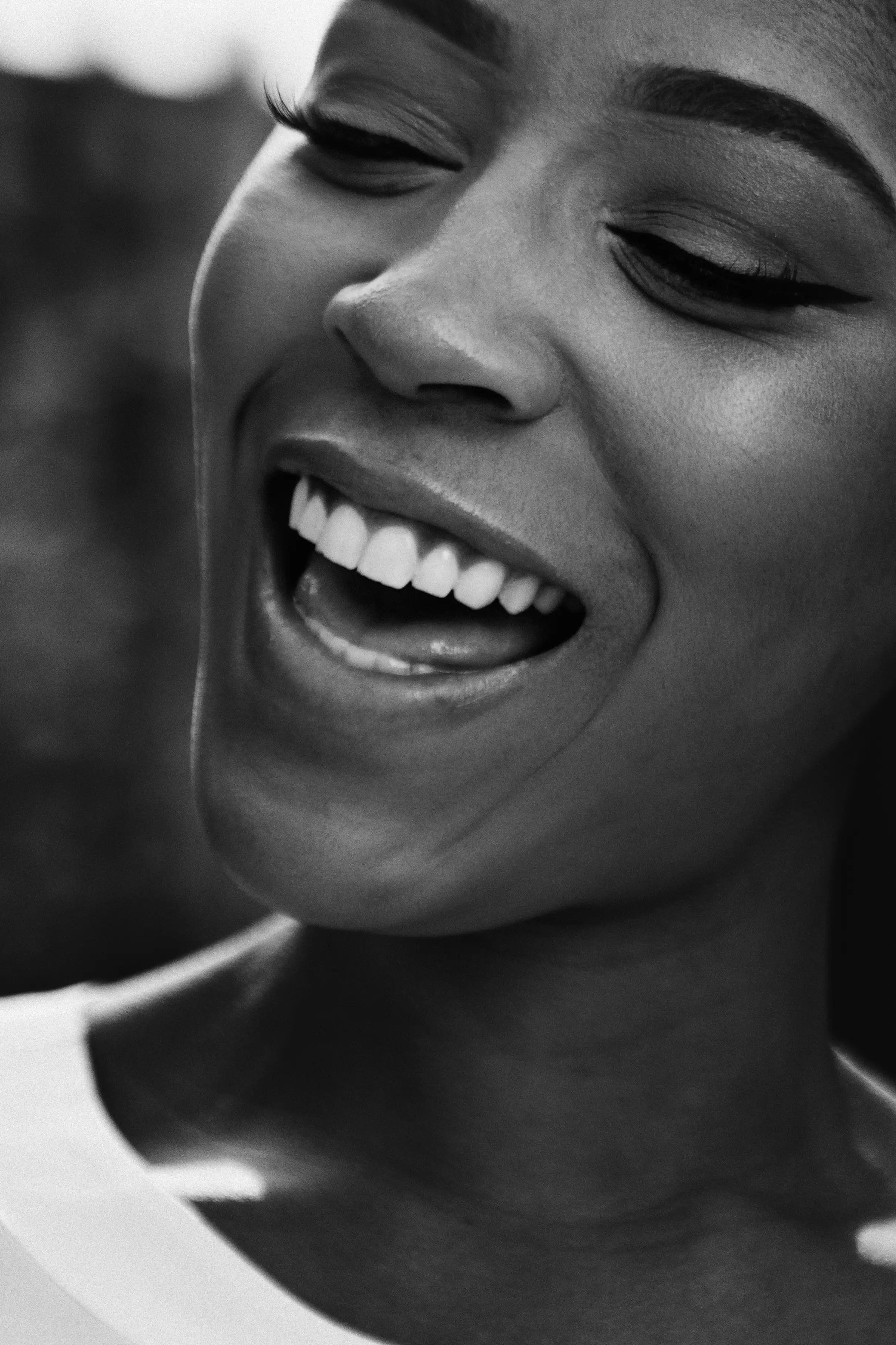 Close Up Cheerful Black Woman white teeth