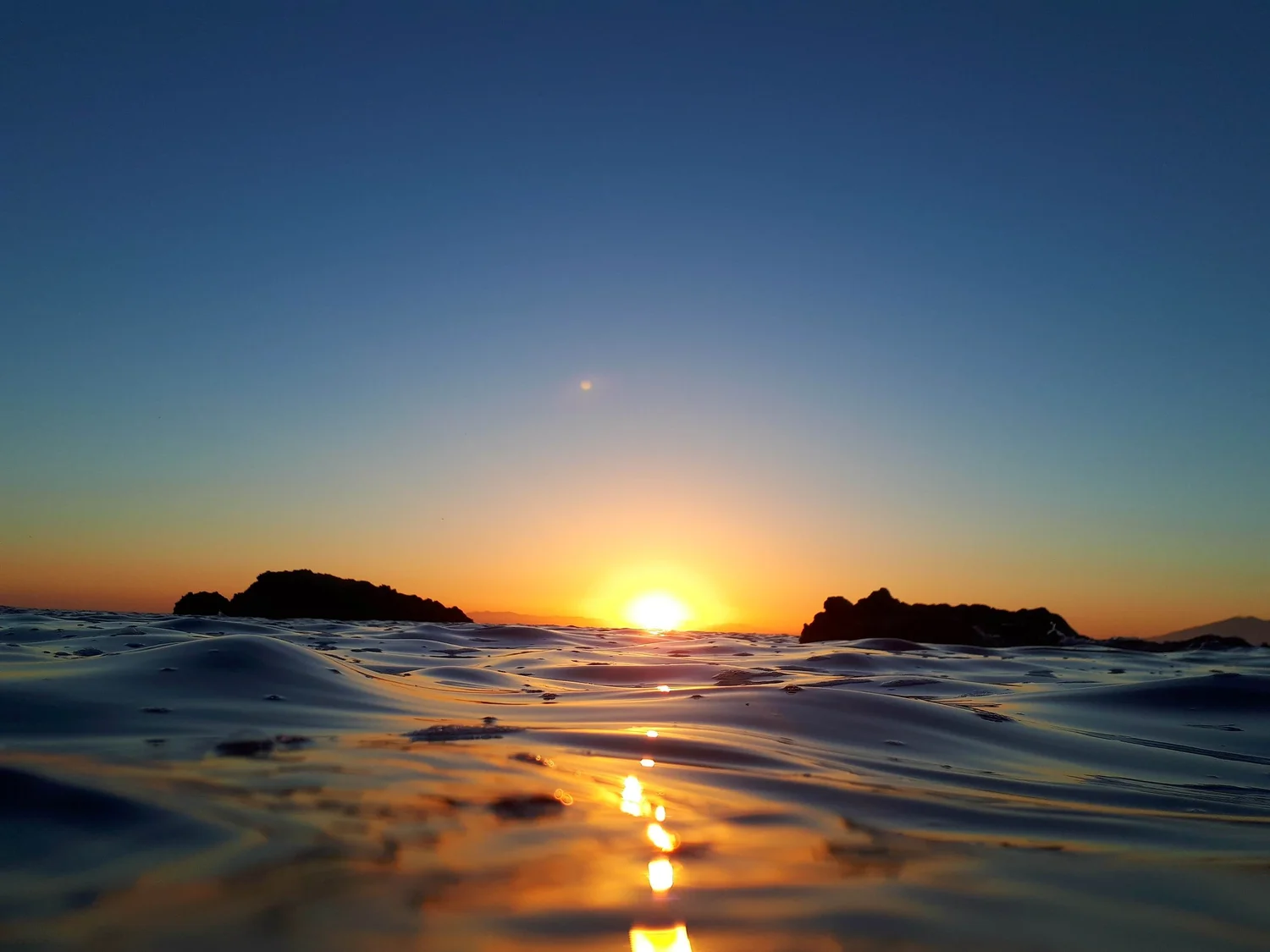 sunset over waves - calming photo