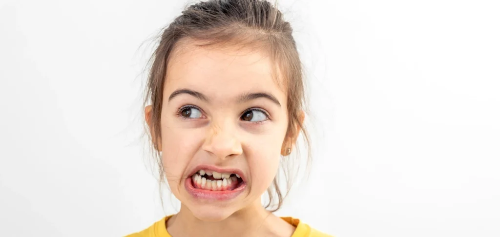 Little Girl With Crooked Teeth Banner