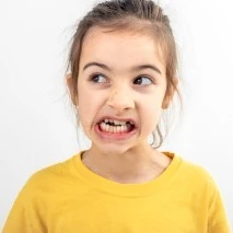 Little Girl With Crooked Teeth Thumbnail
