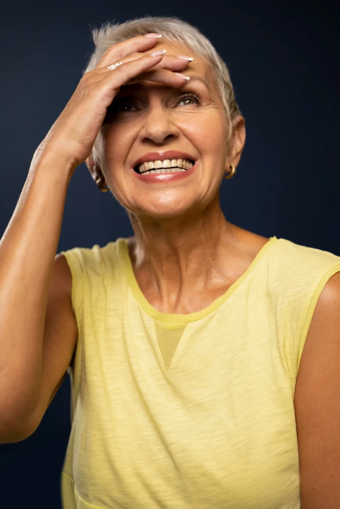 Woman Smiling Yellow Blouse With Implant Overdentures